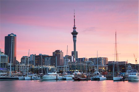 Viaduct Harbour and Sky Tower at sunset, Auckland, North Island, New Zealand, Pacific Foto de stock - Con derechos protegidos, Código: 841-07600259