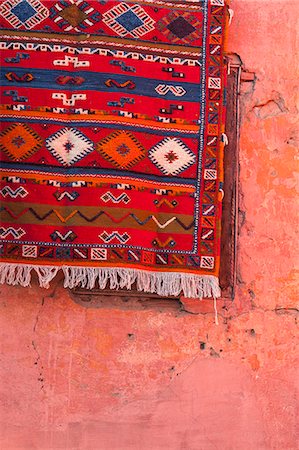 Carpet hanging on red wall, Marrakech, Morocco, North Africa, Africa Stock Photo - Rights-Managed, Code: 841-07653196