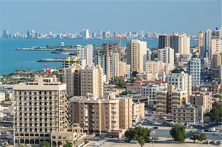 Elevated view of the city skyline and residential suburbs, Kuwait City, Kuwait, Middle East Foto de stock - Con derechos protegidos, Código: 841-07653293