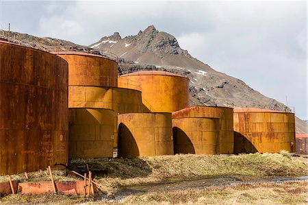 The oil storage tanks at the abandoned and recently restored whaling station at Grytviken, South Georgia, UK Overseas Protectorate, Polar Regions Stock Photo - Rights-Managed, Code: 841-07673321