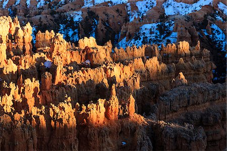 simsearch:841-07673359,k - Hoodoos lit by late afternoon sun with snowy backdrop, from Rim Trail near Sunset Point, Bryce Canyon National Park, Utah, United States of America, North America Photographie de stock - Rights-Managed, Code: 841-07781992