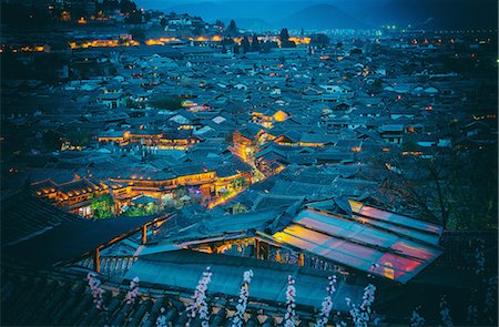 Blue hour shot over roofs of Lijiang Old Town, UNESCO World Heritage Site, Lijiang, Yunnan, China, Asia Photographie de stock - Rights-Managed, Code: 841-07782084