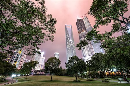 shanghaï - Lujiazui Central Park with Jin Mao Tower, Shanghai World Financial Center and Shanghai Tower under construction, at night, Shanghai, China, Asia Photographie de stock - Rights-Managed, Code: 841-07782090