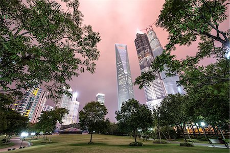 shanghai, china - Lujiazui Central Park with Jin Mao Tower, Shanghai World Financial Center and Shanghai Tower under construction, at night, Shanghai, China, Asia Stock Photo - Rights-Managed, Code: 841-07782090