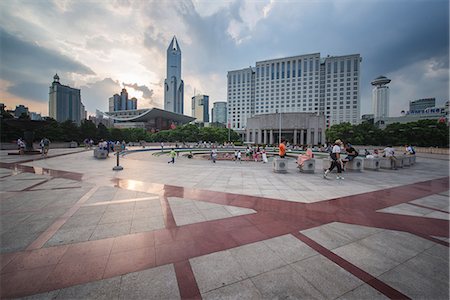 People relaxing and playing at People's Square after work, Shanghai, China, Asia Stock Photo - Rights-Managed, Code: 841-07782135