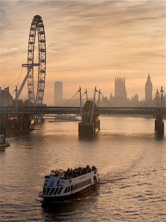 simsearch:841-02919096,k - Millennium Wheel stands with Big Ben and tour boat at sunset, London, England, United Kingdom, Europe Stock Photo - Rights-Managed, Code: 841-07782169