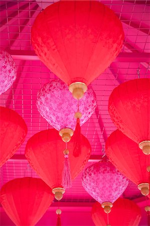 red background - Chinese New Year lanterns, Kowloon Bay, Kowloon, Hong Kong, China, Asia Stock Photo - Rights-Managed, Code: 841-07782544