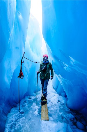 Woman standing in an ice cave, Fox Glacier, Westland Tai Poutini National Park, South Island, New Zealand, Pacific Stock Photo - Rights-Managed, Code: 841-07782688