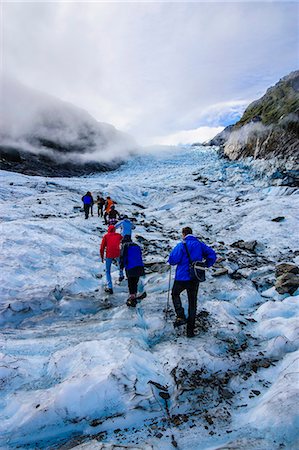 fox glacier - Tourist hiking on Fox Glacier, Westland Tai Poutini National Park, South Island, New Zealand, Pacific Foto de stock - Con derechos protegidos, Código: 841-07782681