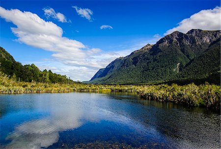 famous places of new zealand - Mountains reflecting in the Mirror Lakes, Eglinton Valley, Fiordland National Park, UNESCO World Heritage Site, South Island, New Zealand, Pacific Stock Photo - Rights-Managed, Code: 841-07782711