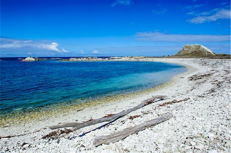 Limestone rocky beach on the clear waters of Kaikoura Peninsula, South Island, New Zealand, Pacific Stock Photo - Rights-Managed, Code: 841-07782774