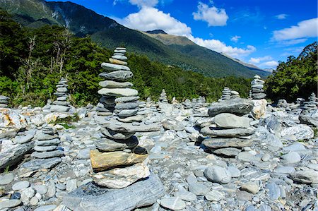 Man made stone pyramids at the Blue Pools, Haast Pass, South Island, New Zealand, Pacific Photographie de stock - Rights-Managed, Code: 841-07782792