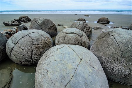 felsbrocken - Moeraki Boulders, Koekohe Beach, South Island, New Zealand, Pacific Foto de stock - Con derechos protegidos, Código: 841-07782803