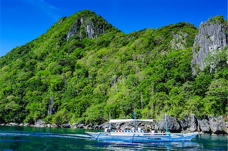 simsearch:841-03672325,k - Outrigger boat cruising in the bay of El Nido, Bacuit Archipelago, Palawan, Philippines, Southeast Asia, Asia Foto de stock - Con derechos protegidos, Código: 841-07782877