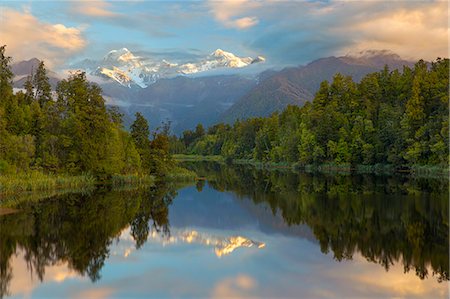 Lake Matheson with Mount Cook and Mount Tasman, West Coast, South Island, New Zealand, Pacific Foto de stock - Con derechos protegidos, Código: 841-07783059