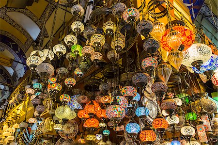 Many hanging and lit colourful and decorative Turkish glass light shades in a shop, Grand Bazaar, Istanbul, Turkey, Europe Photographie de stock - Rights-Managed, Code: 841-07801562