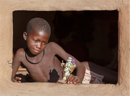 portrait himba - Himba boy with toy, Kaokoland, Namibia, Africa Stock Photo - Rights-Managed, Code: 841-07801584