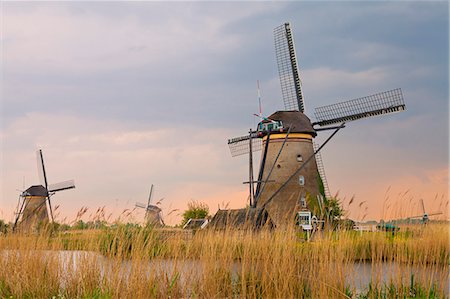 Historic windmills at Kinderdijk, UNESCO World Heritage Site, South Holland, Netherlands, Europe Stock Photo - Rights-Managed, Code: 841-07813745