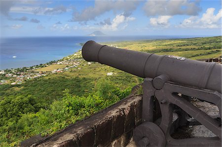 sea defence - Cannon points towards the sea, with St. Eustatius in the distance, Brimstone Hill Fortress, UNESCO World Heritage Site, St. Kitts, St. Kitts and Nevis, West Indies, Caribbean, Central America Stock Photo - Rights-Managed, Code: 841-07913756