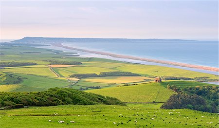 St. Catherine's Chapel and rolling countryside with views beyond to Chesil Beach and the Isle of Portland, Dorset, England, United Kingdom, Europe Stock Photo - Rights-Managed, Code: 841-08031449