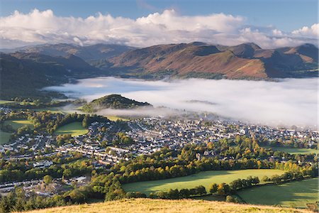Keswick and mist covered Derwent Water at dawn, Lake District National Park, Cumbria, England, United Kingdom, Europe Stock Photo - Rights-Managed, Code: 841-08031465