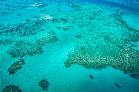 An aerial view of the Great Barrier Reef, UNESCO World Heritage Site, Queensland, Australia, Pacific Photographie de stock - Rights-Managed, Code: 841-08059612