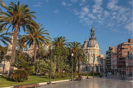 spanish street architecture - Town Hall under a cloud dappled blue sky with palm trees and roses, Cartagena, Murcia Region, Spain, Europe Stock Photo - Rights-Managed, Code: 841-08101735