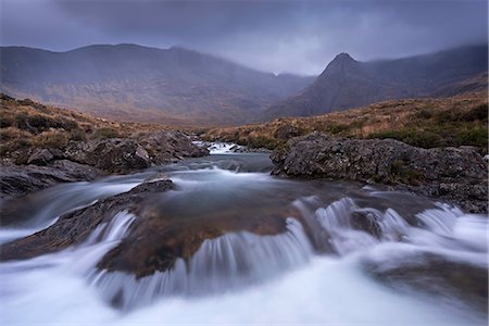 The Fairy Pools beneath the Cuillin Hills mountain range, Isle of Skye, Inner Hebrides, Scotland, United Kingdom, Europe Stock Photo - Rights-Managed, Code: 841-08101995