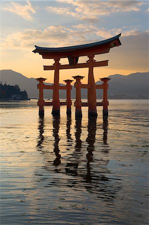 The floating Miyajima torii gate of Itsukushima Shrine at sunset, UNESCO World Heritage Site, Miyajima Island, Western Honshu, Japan, Asia Stock Photo - Rights-Managed, Code: 841-08102265