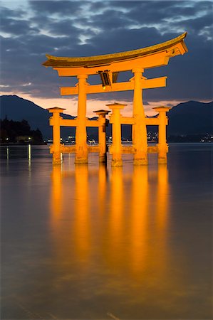 The floating Miyajima torii gate of Itsukushima Shrine at dusk, UNESCO World Heritage Site, Miyajima Island, Western Honshu, Japan, Asia Stock Photo - Rights-Managed, Code: 841-08102267