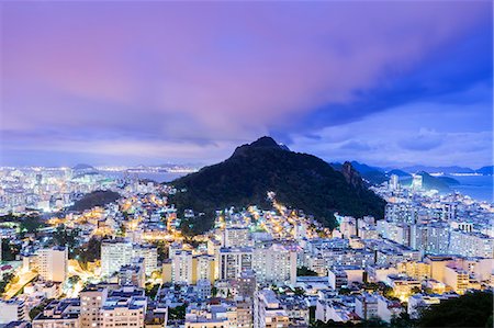 Twilight, illuminated view of Copacabana, the Morro de Sao Joao, Botafogo and the Atlantic coast of Rio, Rio de Janeiro, Brazil, South America Photographie de stock - Rights-Managed, Code: 841-08211508