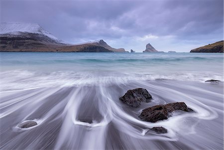 sky mountain - Waves crash onto the black sandy beach at Bour on the island of Vagar in the Faroe Islands, Denmark, Europe Stock Photo - Rights-Managed, Code: 841-08211719