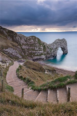 simsearch:6119-07943831,k - Steps leading down to Durdle Door on the Jurassic Coast, UNESCO World Heritage Site, Dorset, England, United Kingdom, Europe Foto de stock - Con derechos protegidos, Código: 841-08211724