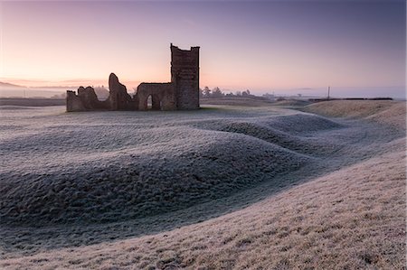 Abandoned ruin of Knowlton Church at dawn on a frosty winter morning, Dorset, England, United Kingdom, Europe Stock Photo - Rights-Managed, Code: 841-08211762