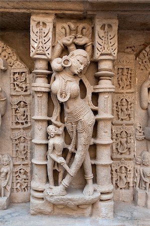 Carved dancing girl on wall of Rani ki Vav, 11th century stepwell dedicated to Hindu god Lord Vishnu, Patan, Gujarat, India, Asia Foto de stock - Con derechos protegidos, Código: 841-08211774