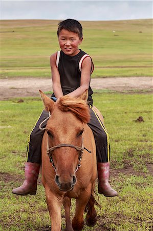 Horse and boy riding bareback at summer nomad camp, Khujirt, Uvurkhangai (Ovorkhangai), Central Mongolia, Central Asia, Asia Stock Photo - Rights-Managed, Code: 841-08239957