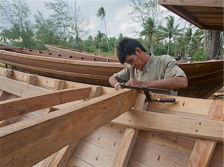 sumatra - Craftsman making a fishing boat on Bintan island, Sumatra, Indonesia, Southeast Asia, Asia Foto de stock - Con derechos protegidos, Código: 841-08239989