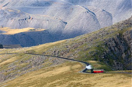 parque nacional de snowdonia - Steam train on route between Llanberis and the summit of Mount Snowdon in Snowdonia National Park, Gwynedd, Wales, United Kingdom, Europe Foto de stock - Con derechos protegidos, Código: 841-08244134