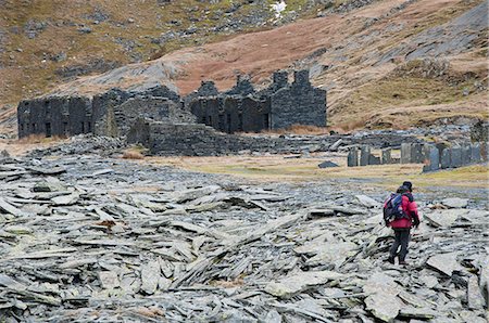 quarry - A hiker walks through the abandoned Croesor Slate Mines, Croesor, Gwynedd, Snowdonia National Park, Wales, United Kingdom, Europe Stock Photo - Rights-Managed, Code: 841-08240049