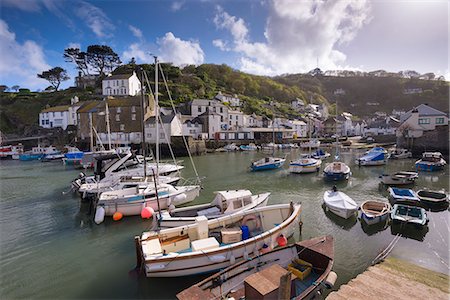polperro - Fishing boats moored in picturesque Polperro harbour on a sunny spring evening, Cornwall, England, United Kingdom, Europe Stock Photo - Rights-Managed, Code: 841-08240112
