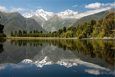 Southern Alps from Lake Matheson, Fox Glacier village, Westland, South Island, New Zealand, Pacific Photographie de stock - Rights-Managed, Code: 841-08279179