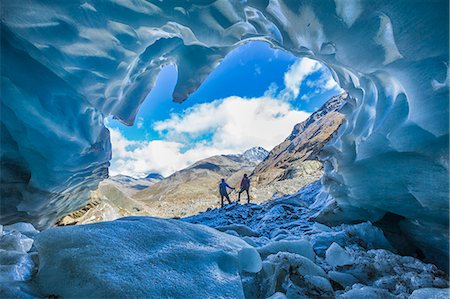 Hikers inside Forni Glacier, Forni Valley, Stelvio National Park, Valtellina, Lombardy, Italy, Europe Stock Photo - Rights-Managed, Code: 841-08357382