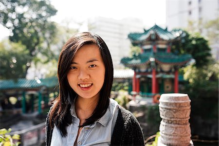 Portrait of young woman, Wong Tai Sin Temple, Kowloon, Hong Kong, China, Asia Fotografie stock - Rights-Managed, Codice: 841-08357760