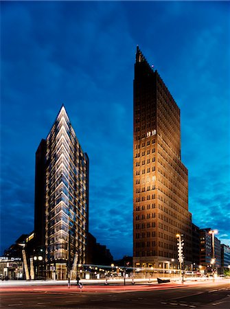 futuristic glass buildings - Exterior of Debis Tower and Kollhoff Tower at night, Potsdamer Platz, Berlin, Germany, Europe Stock Photo - Rights-Managed, Code: 841-08357774