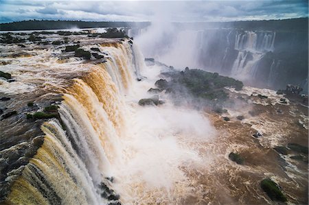 Iguazu Falls (Iguacu Falls) (Cataratas del Iguazu), UNESCO World Heritage Site, seen from the Brazilian side, border of Brazil Argentina and Paraguay, South America Stock Photo - Rights-Managed, Code: 841-08421103