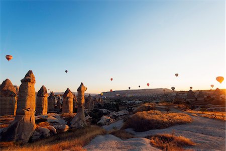 Balloon flight over Goreme, UNESCO World Heritage Site, Goreme, Cappadocia, Anatolia, Turkey, Asia Minor, Eurasia Stock Photo - Rights-Managed, Code: 841-08421369