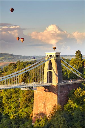 Clifton Suspension Bridge, with hot air balloons in the Bristol Balloon Fiesta in August, Clifton, Bristol, England, United Kingdom, Europe Stock Photo - Rights-Managed, Code: 841-08438620