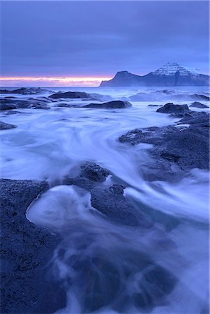 simsearch:841-08211742,k - Surging waves rush over the basalt ledges of Gjogv at dawn, Eysturoy, Faroe Islands, Denmark, Europe Stock Photo - Rights-Managed, Code: 841-08438765