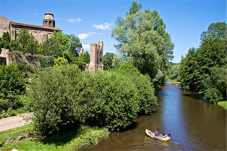 Ruins and Benedictine abbey tower, along the Senouire river, and canoeing, at Lavaudieu, a medieval village, Auvergne, Haute Loire, France, Europe Photographie de stock - Rights-Managed, Code: 841-08542651