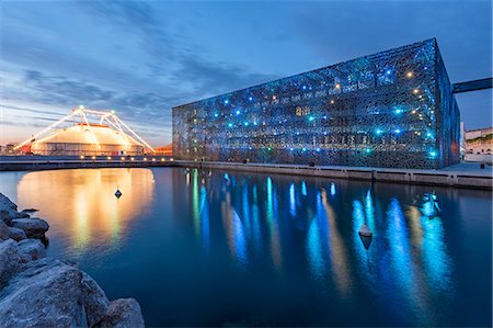 The illuminated Museum of European and Mediterranean Civilisations, at the waterfront in Marseille, Bouches-du-Rhone, Provence, France, Europe Photographie de stock - Rights-Managed, Code: 841-08569041